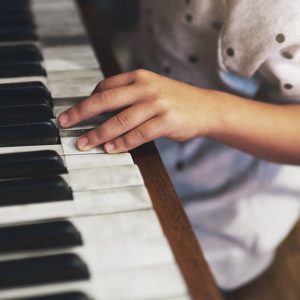 Child playing piano