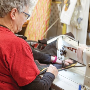 Woman using a sewing machine