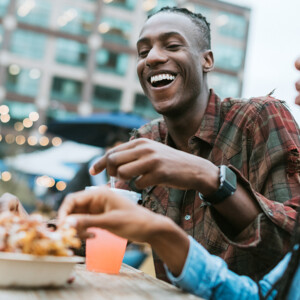 Couple enjoying a meal together outdoors