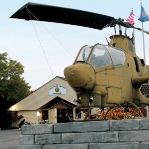 AH-1 Cobra in front of American Legion